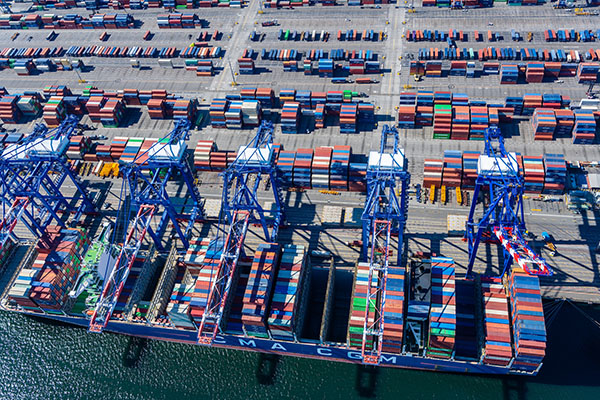 Aerial view of a container ship berthed at the Fenix Marine Services terminal at the Port of Los Angeles.