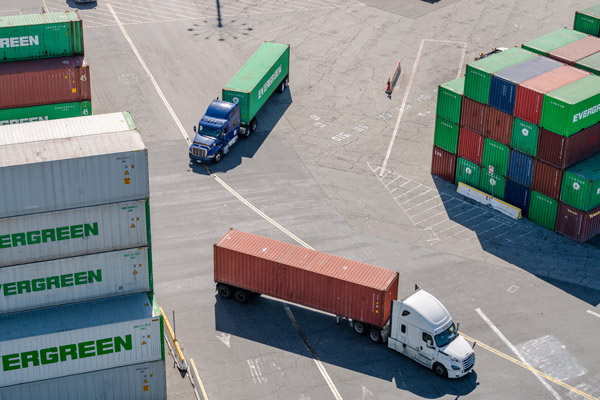 Aerial view of trucks on a port terminal.