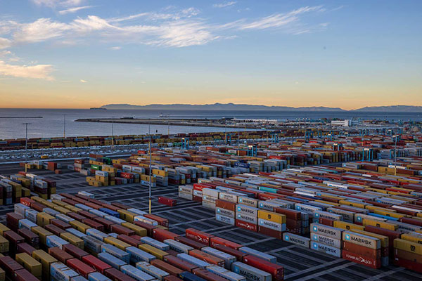 Busy container and intermodal rail activity at APM Terminals Pacific's Los Angeles facility.