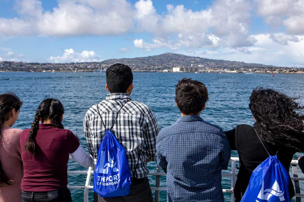 Students on a boat wearing Port of LA backpacks.